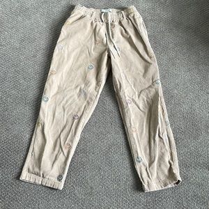 Urban Outfitters smiley face corduroy pants
